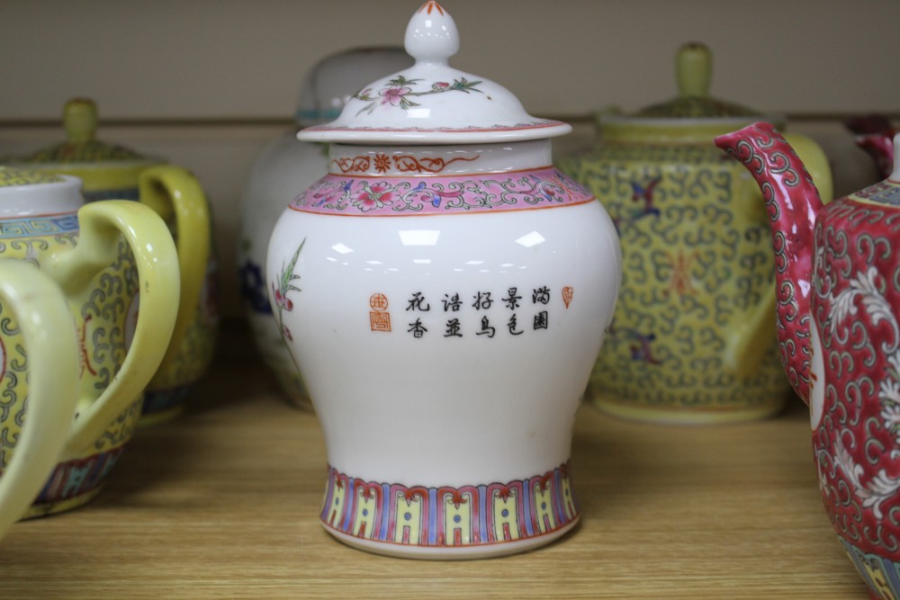 Three Chinese blue and white prunus pattern ginger jars, two other jars and ten assorted teapots